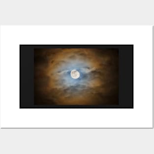 Mystery spooky moon shining through a clouds Posters and Art